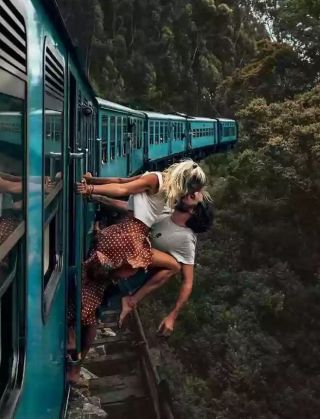 Kissing almost falling from a train